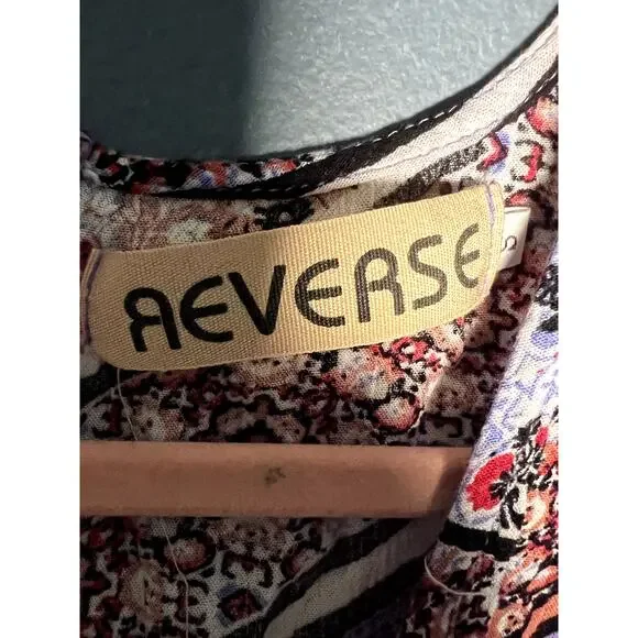 Reverse Pink and Blue Floral Romper Size Small Bell Sleeves V Neck - Picture 7 of 7